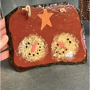 Slate packing two snowman heads very old